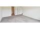 Neutral bedroom with carpeted floors and ample natural light at 4918 Gray Owl Ter, Palmetto, FL 34221
