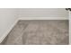 Cozy carpeted bedroom features neutral colors and ample natural light at 4918 Gray Owl Ter, Palmetto, FL 34221
