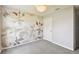 A quaint bedroom is decorated with a floral wallpaper at 4918 Gray Owl Ter, Palmetto, FL 34221