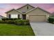 Charming single-Gathering home with a well-manicured lawn and beautiful landscaping at 4918 Gray Owl Ter, Palmetto, FL 34221