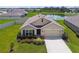 Charming single-Gathering home with well-maintained landscaping and a two-car garage at 4918 Gray Owl Ter, Palmetto, FL 34221