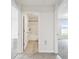A hallway features doorways to the bathroom and bedroom at 4918 Gray Owl Ter, Palmetto, FL 34221