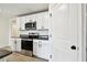 Modern kitchen boasts sleek stainless steel appliances and granite countertops at 4918 Gray Owl Ter, Palmetto, FL 34221