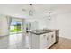 Kitchen island equipped with a sink and dishwasher at 4918 Gray Owl Ter, Palmetto, FL 34221
