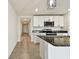 Modern kitchen with granite countertops and stainless steel appliances at 4918 Gray Owl Ter, Palmetto, FL 34221