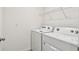 Bright laundry room with modern washer and dryer at 4918 Gray Owl Ter, Palmetto, FL 34221