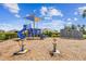Community playground offering slides, climbing and spring toys on mulch base at 4918 Gray Owl Ter, Palmetto, FL 34221