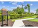 Silverstone North playground rules & regulations sign with manicured hedge row at 4918 Gray Owl Ter, Palmetto, FL 34221