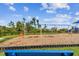Bright community playground featuring swings, slides, and play structures, perfect for Gathering fun at 4918 Gray Owl Ter, Palmetto, FL 34221