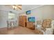 Inviting living room adjacent to a functional kitchen, complete with modern appliances and ample cabinet space at 503 Albee Farm Rd # B6, Venice, FL 34285