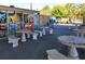 Outdoor patio with decorative stone tables and seating outside a snack bar with supplies, food and drinks at 503 Albee Farm Rd # B6, Venice, FL 34285