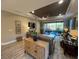 Open-concept living area with lots of natural light and access to the lanai at 5031 Serata Dr, Bradenton, FL 34211