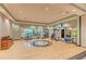 Spacious yoga and dance studio with hardwood floors and abundant natural light at 5031 Serata Dr, Bradenton, FL 34211