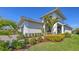 Beautiful single-Gathering home with a manicured lawn and lush tropical landscaping in a desirable neighborhood at 5209 Barnett Cir, Lakewood Ranch, FL 34211
