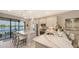 Bright kitchen with an island and stainless steel appliances, with patio access at 5209 Barnett Cir, Lakewood Ranch, FL 34211