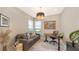 Cozy home office with a comfortable couch and view of the outdoors at 5209 Barnett Cir, Lakewood Ranch, FL 34211