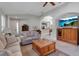 Bright living room with tile floors, modern furnishings, and an open concept design at 5548 Simonton St, Bradenton, FL 34203
