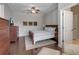 Relaxing bedroom with wood floors, comfortable bed, and soft lighting at 5548 Simonton St, Bradenton, FL 34203