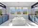 Luxurious bathroom features a standalone tub, dual vanities, and plenty of natural light at 5670 Rock Dove Dr, Sarasota, FL 34241
