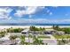 Expansive beachfront view, a glimpse of sun, sand, and sea at 5855 Midnight Pass Rd # 327, Sarasota, FL 34242