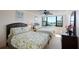 Bright bedroom with two beds and large window with city views at 5855 Midnight Pass Rd # 327, Sarasota, FL 34242