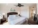 Bedroom featuring a king bed, ceiling fan and closet at 5855 Midnight Pass Rd # 327, Sarasota, FL 34242
