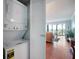 Convenient in-unit laundry featuring a stacked washer and dryer at 5855 Midnight Pass Rd # 327, Sarasota, FL 34242