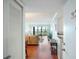 Inviting living room with wood floors and a view of the balcony at 5855 Midnight Pass Rd # 327, Sarasota, FL 34242
