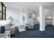 Bright lobby featuring stylish seating, neutral tones, and modern decor at 5855 Midnight Pass Rd # 327, Sarasota, FL 34242
