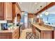 Gourmet kitchen with modern appliances, custom cabinets, and an open layout at 6140 Midnight Pass Rd # 103, Sarasota, FL 34242