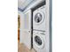 Stacked laundry closet is conveniently located right off the bathroom at 6140 Midnight Pass Rd # 103, Sarasota, FL 34242