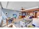 Inviting living space with a dining area and seamless flow to the kitchen at 6140 Midnight Pass Rd # 103, Sarasota, FL 34242