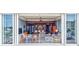 Cozy condo with a view, featuring an open living space and modern kitchen at 6140 Midnight Pass Rd # 103, Sarasota, FL 34242