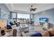 Cozy living room with coastal decor, comfortable seating, and ocean view at 6140 Midnight Pass Rd # 103, Sarasota, FL 34242