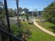 Community pool and garden view from screened lanai at 6142 7Th Ave W # 6142, Bradenton, FL 34209