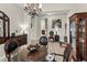 Bright dining area with a glass-top table, decorative lighting, and neutral walls at 6280 Cassia St, Bradenton, FL 34203