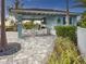 Covered outdoor kitchen and dining area for residents at 6280 Cassia St, Bradenton, FL 34203