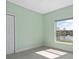 A bright bedroom with a water view from the window and neutral carpet and paint at 7157 Strand Cir # 24-102, Bradenton, FL 34203