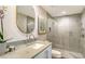 Modern bathroom with a glass-enclosed shower, stylish fixtures, and contemporary vanity at 800 N Tamiami Trl # 312, Sarasota, FL 34236