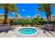 Serene hot tub area surrounded by lush greenery, offering a private and relaxing experience at 800 N Tamiami Trl # 312, Sarasota, FL 34236