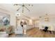 Bright open-concept living area showcasing modern design and updated kitchen at 800 N Tamiami Trl # 312, Sarasota, FL 34236