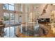 Elegant lobby featuring marble floors, seating area, and glass doors at 800 N Tamiami Trl # 312, Sarasota, FL 34236