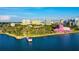 Breathtaking aerial view of the waterfront with a pier, park, and cityscape in the backdrop at 800 N Tamiami Trl # 312, Sarasota, FL 34236