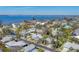 Panoramic aerial view of a picturesque waterfront community with gorgeous homes, lush landscaping, and stunning bay vistas at 8012 18Th W Ave, Bradenton, FL 34209