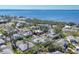 Expansive aerial view of a coastal neighborhood featuring beautiful homes, mature trees, and waterfront access at 8012 18Th W Ave, Bradenton, FL 34209