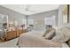 This cozy bedroom features a neutral color scheme and vintage wooden furniture at 8012 18Th W Ave, Bradenton, FL 34209