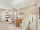 Charming dining area with a glass table, wicker chairs, and natural lighting at 8012 18Th W Ave, Bradenton, FL 34209