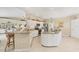 Modern kitchen with granite countertops, white cabinetry, and a spacious island perfect for casual dining at 8012 18Th W Ave, Bradenton, FL 34209