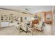 Spacious living room featuring built-in shelving, comfortable furniture, and a cozy atmosphere for relaxation at 8012 18Th W Ave, Bradenton, FL 34209