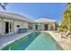 Beautiful pool area with comfortable outdoor seating and a calming atmosphere at 8012 18Th W Ave, Bradenton, FL 34209